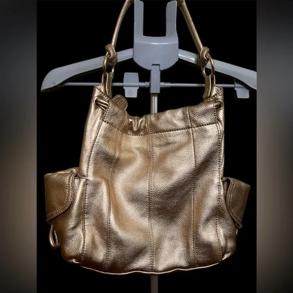 Michael Kors Metallic Gold Leather Drawstring Shoulder Bag. - Picture 3 of 16